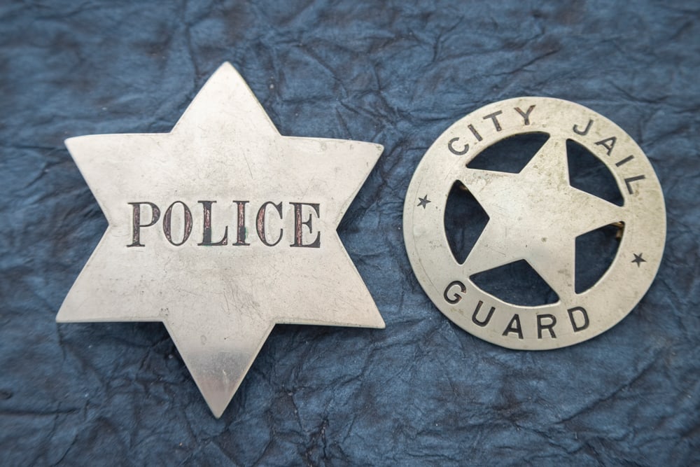 This lot consists of two Badges to include: (1) Circle 5-point cut-out Star Badge marked “CITY (1 of 2)