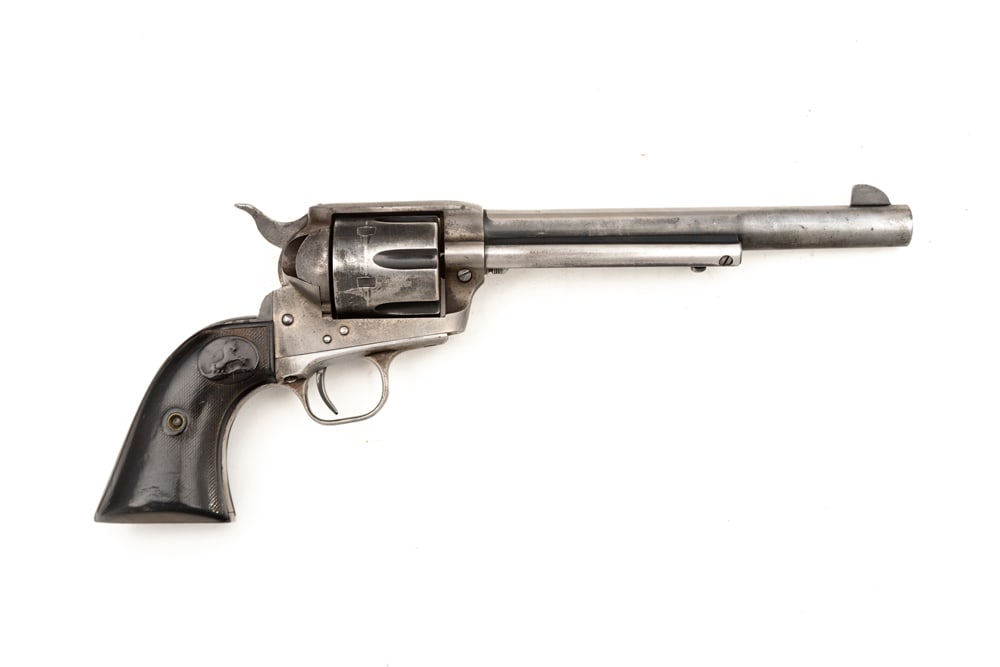 Colt SAA 2nd Gen Revolver, .45 caliber, SN 81424SA, 7 1/2" barrel, two-piece hard rubber stocks, (1 of 2)