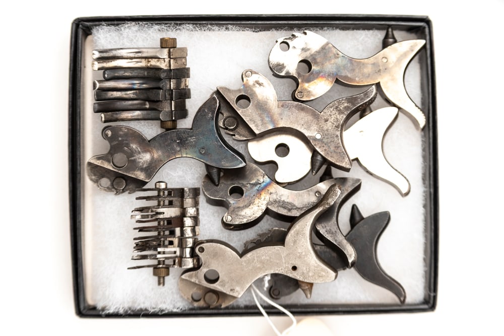 Group of Colt Parts for Single Action Revolvers to include: Seven Hammers, seven Triggers, and eight (1 of 1)
