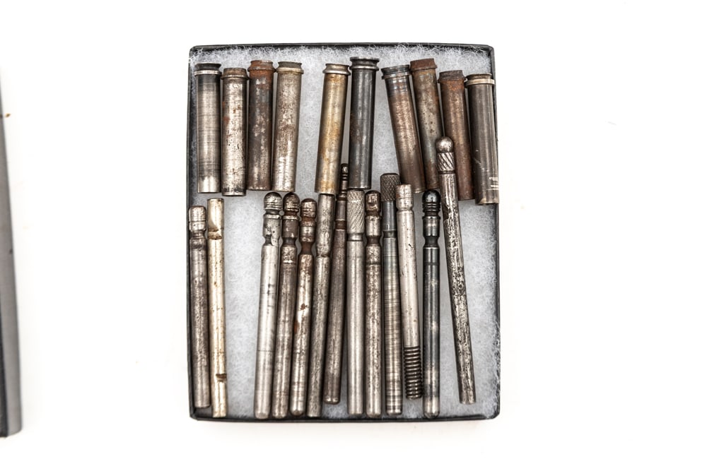 Group of 14 Cylinder Pins and ten Cylinder Sleeves for Single Action Revolvers. Will be sold as one (1 of 1)