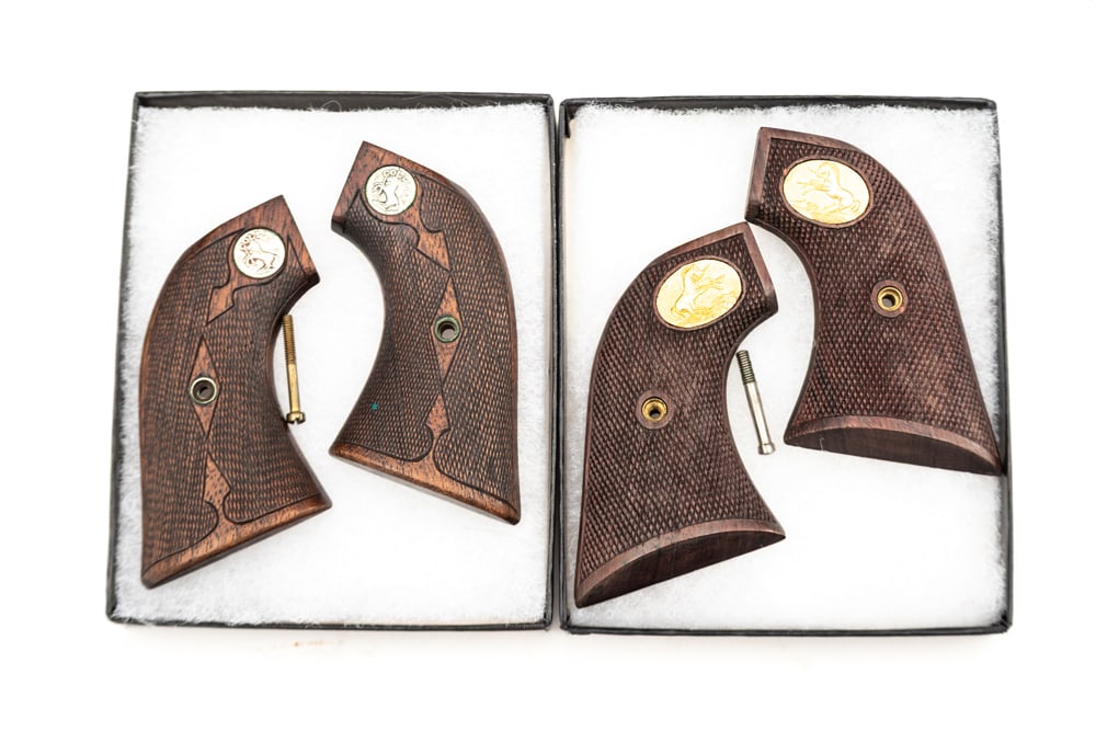 Two pairs of checkered two-piece walnut Grips for Colt SAA Revolvers. One has gold inlaid Medallion, (1 of 1)
