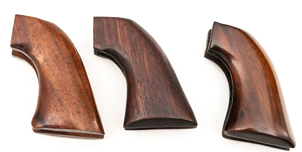 Collection of three pairs of one-piece wooden Grips for Colt SAA Revolvers. Will be sold as one (1 of 1)