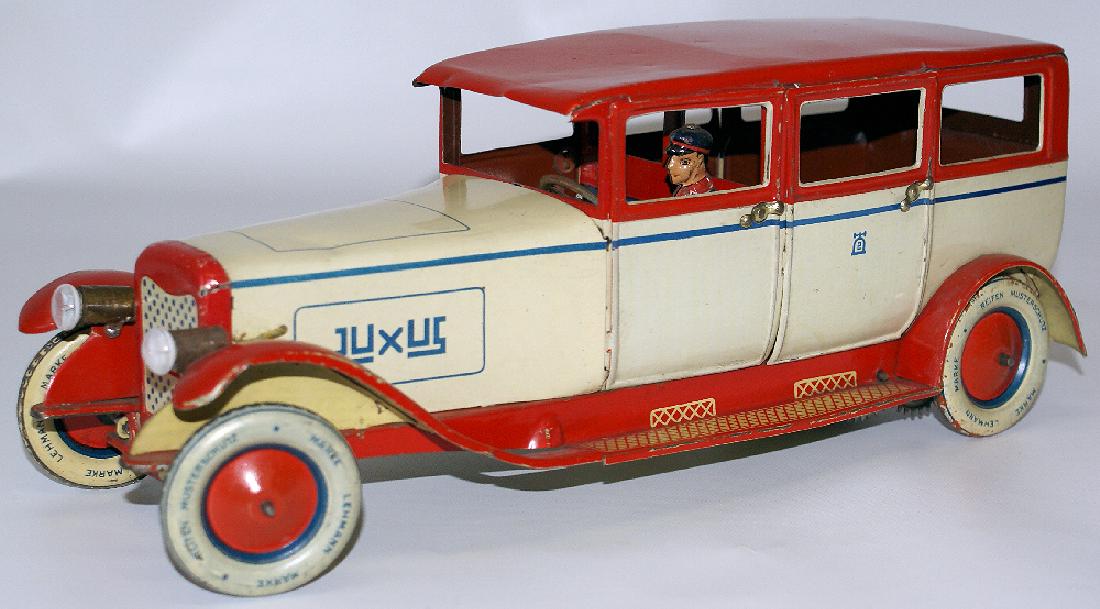Prewar Germany Windup LEHMANN EPL 785 'Luxus' Limo: Vintage LEHMANN (Prewar Germany) Tinplate Lithographed Windup EPL 785 'LUXUS' Limo Car with battery operated headlights that even still have the original bulbs. Perfect working order. Ivory body with