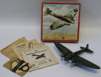 Mid 1930's Lehmann Twin Engine Fighter Airplane: Mid 1930's Lehmann Twin Engine Fighter Airplane Heinkel-Kampfflugzeug He 111, NR 833, German World War II. C/2141. Includes original instructions and box. Like new condition. 7-1/4" wingspan. Made in