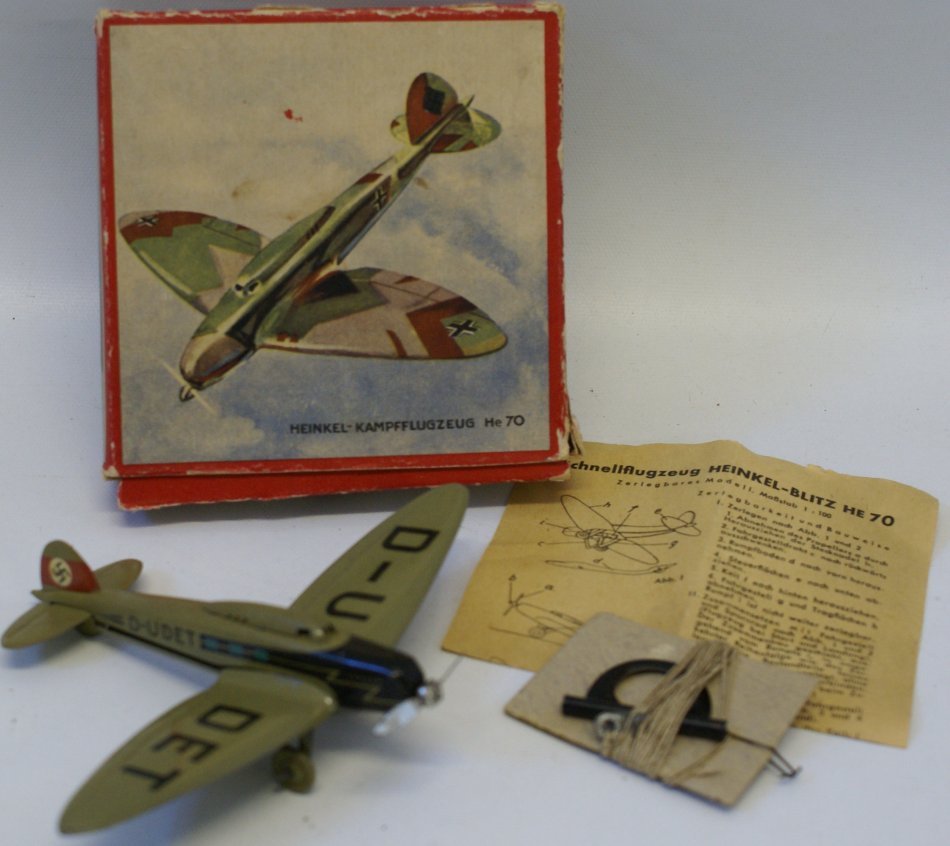 Lehmann Germany Single Engine World War II Fighter: Lehmann Germany Single Engine World War II Fighter Plane, Heinkel-Kampfflugzeug He 70. Nr. 819. Like new condition in the original box including instructions. This airplane was also produced as the D