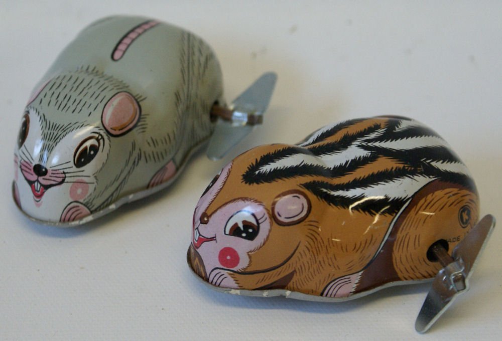 Vintage Tin Wind-up Squirrel & Mouse Pair, (circle) K: Pair of vintage 1950s tin wind-up animals, Squirrel & Mouse. Made by circle K, Japan. Old store stock. Each measures 2-3/4" long with nice lithographed detail and rubber wheels. Unused old store stock
