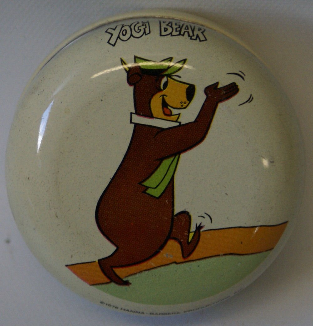 1976 Vintage Hanna Barbera YOGI BEAR tin yo yo, sleeper: Vintage Hanna Barbera YOGI THE BEAR tin metal yo-yo, with sleeper action. Beautiful bright tin plate lithography. Old store stock. Shows Yogi walking and clapping. Yoyo measures 2-1/2" in diameter. Ma