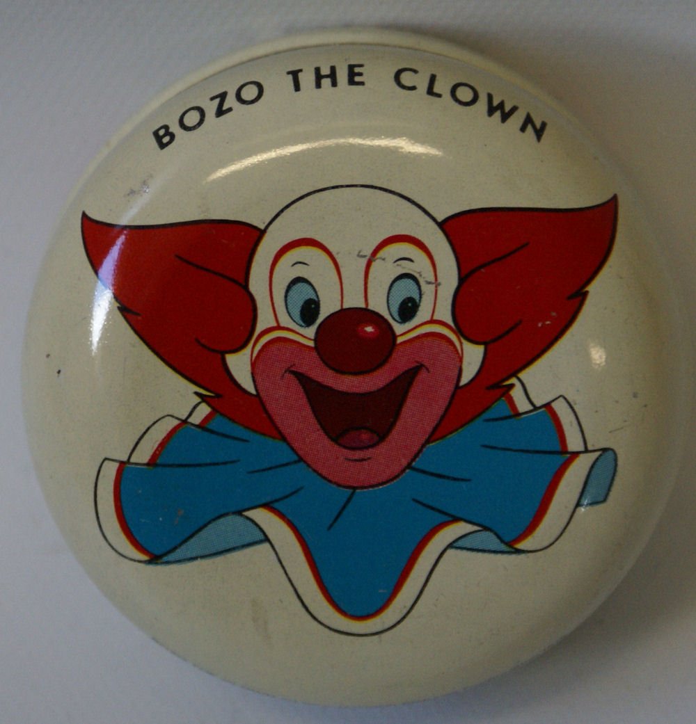 1976 Vintage Hanna Barbera BOZO THE CLOWN tin yo yo,: Vintage Hanna Barbera Bozo the Clown tin metal yo-yo, with sleeper action. Beautiful bright tin plate lithography. Old store stock. Shows a picture of Bozo's goofy clown face. Yoyo measures 2-1/2" in 