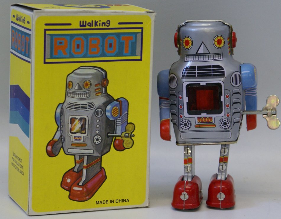 Tin Litho Wind up WALKING ROBOT Space Toy, mint in box: Tin Lithographed Wind up WALKING ROBOT Space Toy with key, 5-1/2" tall, mint in original box, made in China. Unused and not displayed. Spark action! Great addition for your robot display collection. U