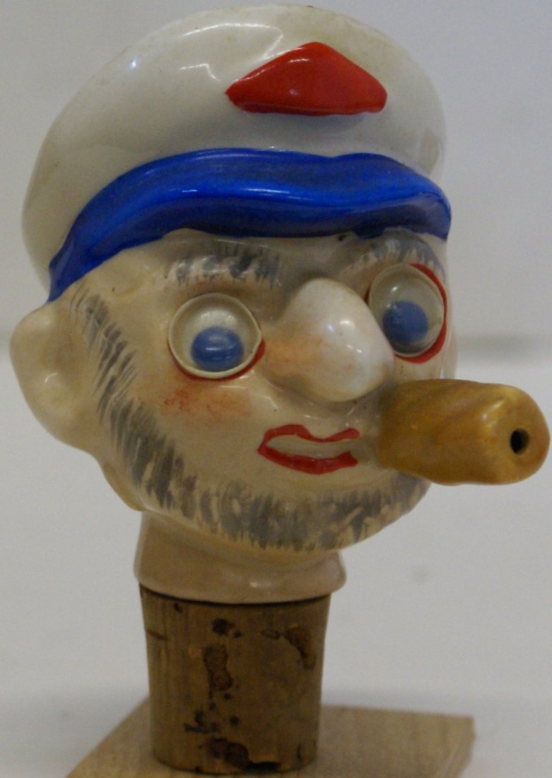 RARE Vintage porcelain sailor bottle wine stopper cork: RARE Vintage porcelain sailor bottle wine stopper cork and pourer smoking cigar, liquor can be poured from the sailor's cigar, has cute googly eyes, hand painted, 3-1/2" tall, funny little character, 