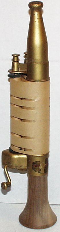 Vintage 1930s Clarlola Mechanical Mouth Organ: Vintage Antique Roll Operated Clarlola Mechanical Mouth Organ Instrument. QRS piano roll arranger J. Lawreence Cook. Made in Chicago IL, USA. Comes complete with a paper roll. Works well. Measures 13"