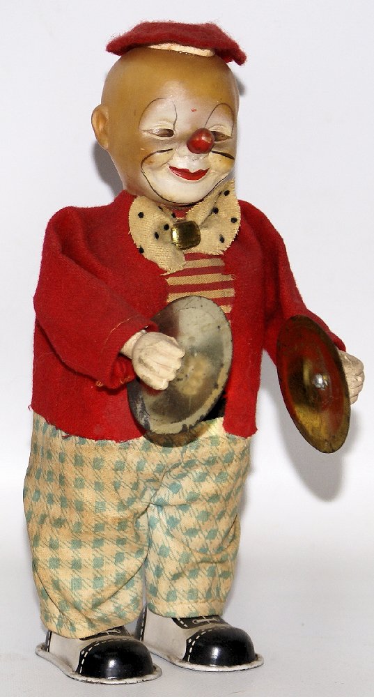 RARE Vintage Mechanical Wind-up Musical Cymbal Playing: Vintage Original 1950's Mechanical Wind-up Musical Cymbal Playing Clown Figure, Made in Japan. Nice working condition. When wound, the cute little clown claps his hands together to play the cymbals an
