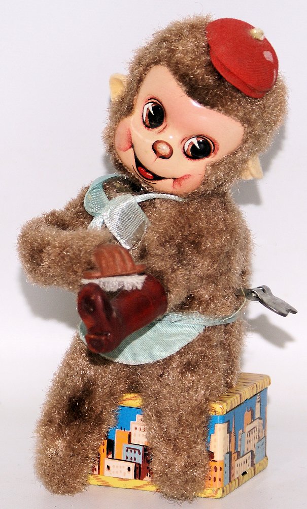 Vintage Original Mechanical Wind-up LITTLE MONKEY BOOT: Vintage Original 1950's Mechanical Wind-up LITTLE MONKEY BOOT SHOE SHINER, Japan. Nice working condition. When wound, the cute little monkey moves his head back and forth as he concentrates and polish