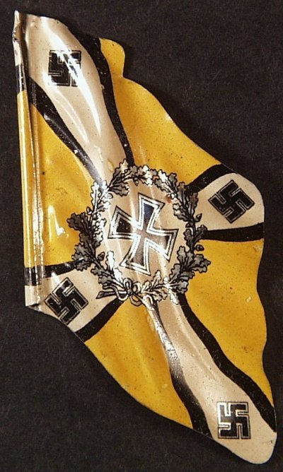 Vintage WWII Nazi Swastica Tin Lithographed Flag for: Vintage WWII Nazi Swastica Tin Lithographed Flag, one side shows an iron cross in the center and the reverse showing an eagle carrying a Swastica. Measures 1-3/4" x 2-7/8", beautiful bright lithograph
