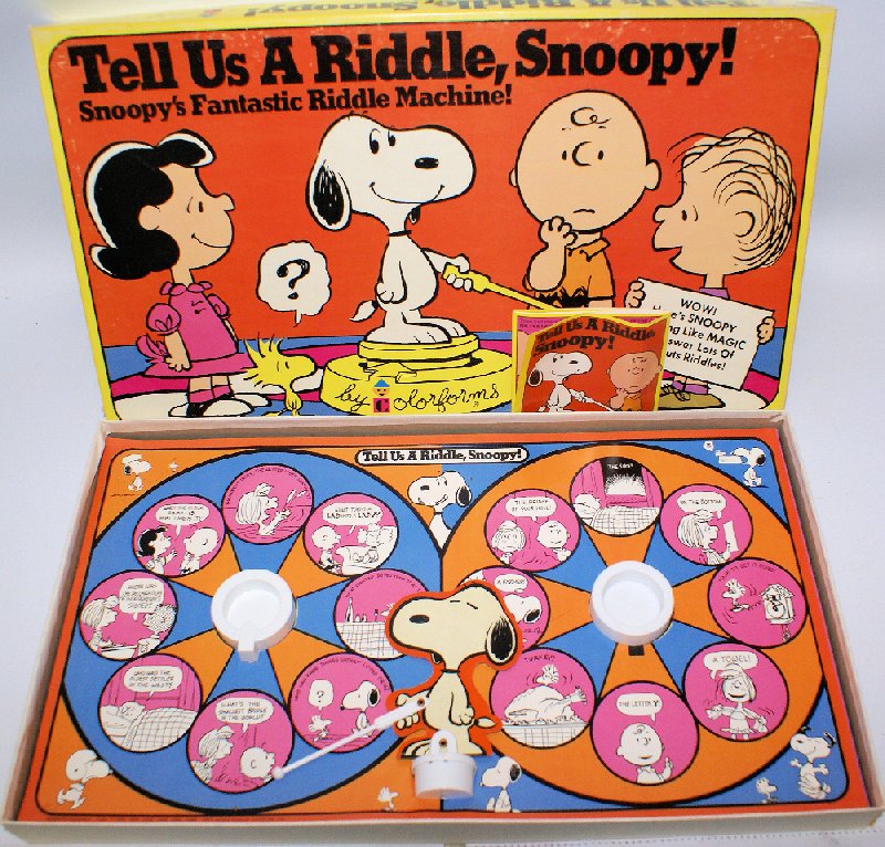 Vintage 1965 TELL US A RIDDLE SNOOPY Riddle Machine: Vintage 1965 TELL US A RIDDLE SNOOPY Riddle Machine Game by Colorforms, in the original box. Here's your chance to match wits with Snoopy and his fantastic riddle machine. A United Feature Syndicate, 