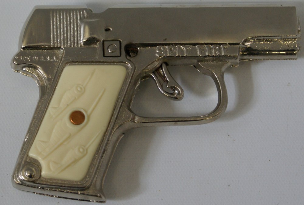 Fantastic Cast Iron Hubley 'Spit Fire' Automatic Cap: Fantastic Cast Iron Hubley 'Spit Fire' Automatic Cap Gun Pistol, totally restored by Classic Tin Toy Co., including heavy copper and nickel plating, measures 4-3/4" long. Gun has the 3 spitfires on th