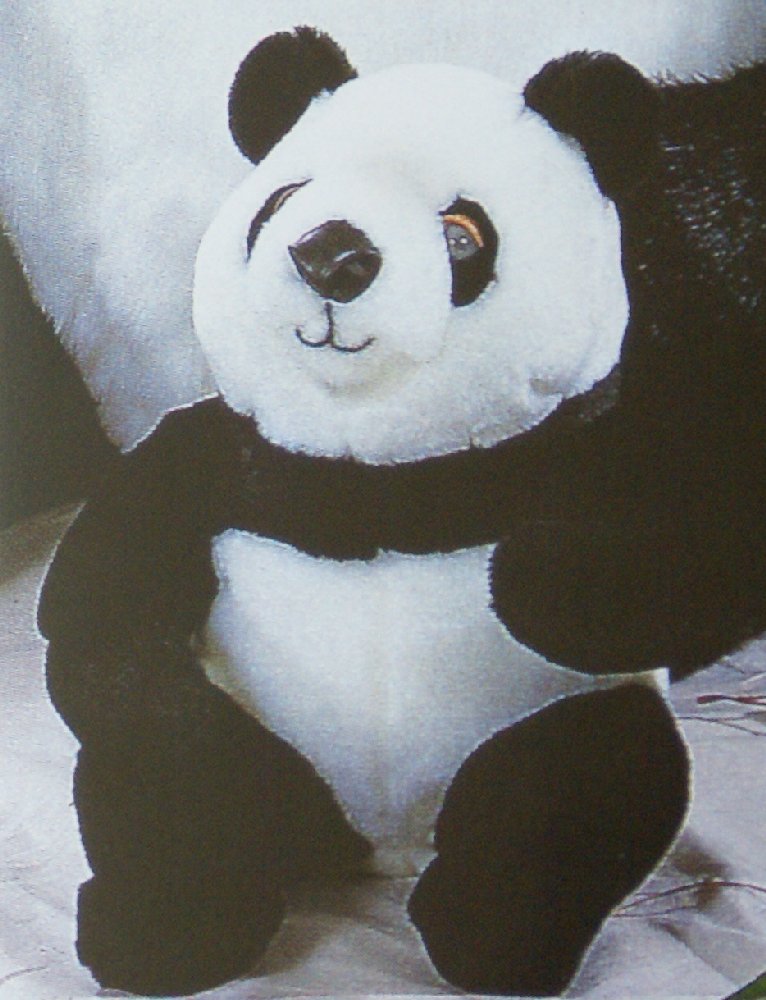 Sonni (Germany) Stuffed 15-3/4" Sitting Panda Bear: Adorable Sonni (Germany) plush stuffed panda bear (pandabar pandabär). This cute little guy is black and white, and measures 15-3/4" tall. Extremely high, collectors quality! Made by Sonni (Zum Spiel