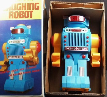 Vintage 1970s Bat Op LAUGHING ROBOT Yonezawa, Japan: Vintage 1970's Battery Operated LAUGHING ROBOT by Yonezawa, Japan. Mint condition in the original box. Robot measures 10" tall. The Laughing Robot moved in bump-and-go action. He also laughs and makes