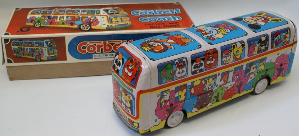 Vintage 1960s Tin Friction Corbett Coach w/ Disney: Vintage 1960s Tin Litho Friction Corbett Coach with Disney Characters, bright color lithography, friction with bell sound, 11" long, mint condition in the original box, old store stock, showing Donald