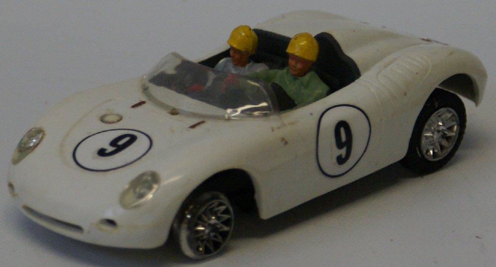Strombecker #9 Racer PORSCHE Spyder 1:32 Scale Plastic: Vintage Strombecker #9 Racer PORSCHE Spyder 1:32 Scale Plastic White Slot Car Race Car. Needs 2 tires and a motor. The other 2 tires should probably be replaced too as they are getting brittle. Needs 