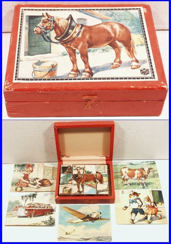 German Educational Fun Building Blocks Puzzle Set: Vintage German Building Blocks Puzzle Set in Original Box. Builds 6 different puzzles including one of a horse, a cow, 2 cat kids playing, airplane, bus, and little girl with her kitty cat. Box measur