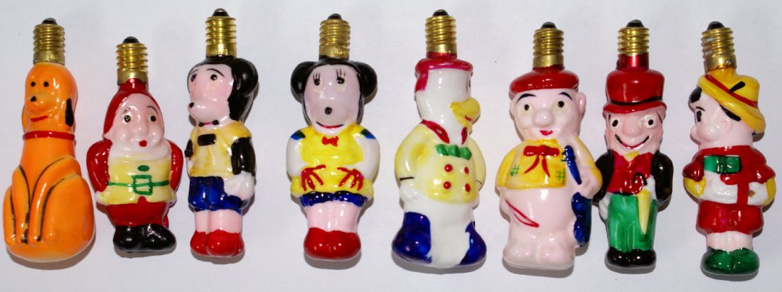 Set of 8 ORIGINAL Disney Paramount Milk GlassFigural: RARE & COMPLETE set of 8 antique vintage milk glass figural Disney Christmas tree light bulbs, marked "15V Japan" and "PAR" within a triangle which was the symbol for Paramount. No cracks, chips, or d