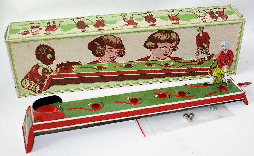 Tin Golf Game , West Germany, Old Store Stock: Vintage Tin Lithographed Golf Game, made in West Germany. Comes complete with the 3 metal balls. Mint condition in the original box. Old store stock. Nice bright lithography. Amazing graphics inside a