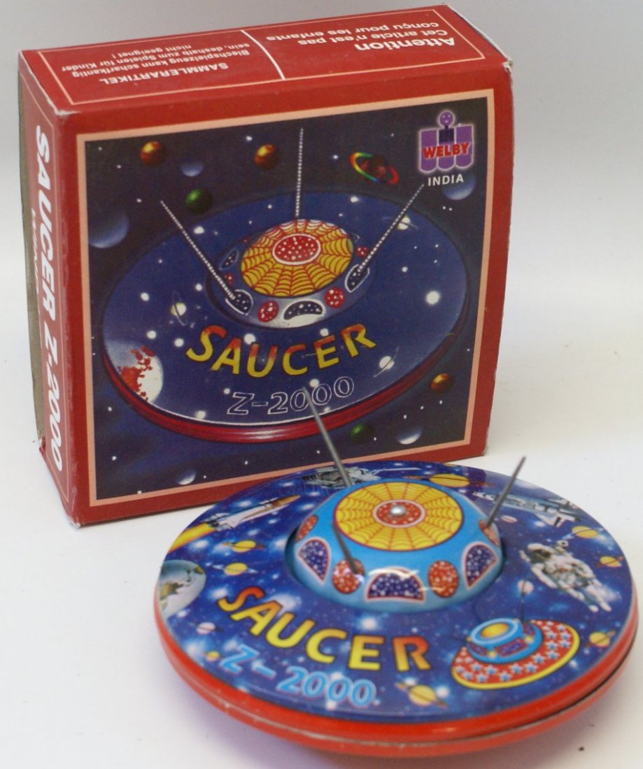 Tin Windup SAUCER Z-2000 Space Ship Fying Saucer, new: Tin Lithographed Wind up SAUCER Z-2000 Space Ship Fying Saucer Toy with key, 5-1/4" diameter, mint in original box, made in India by Welby. Unused and not displayed. Great addition for your tin windup