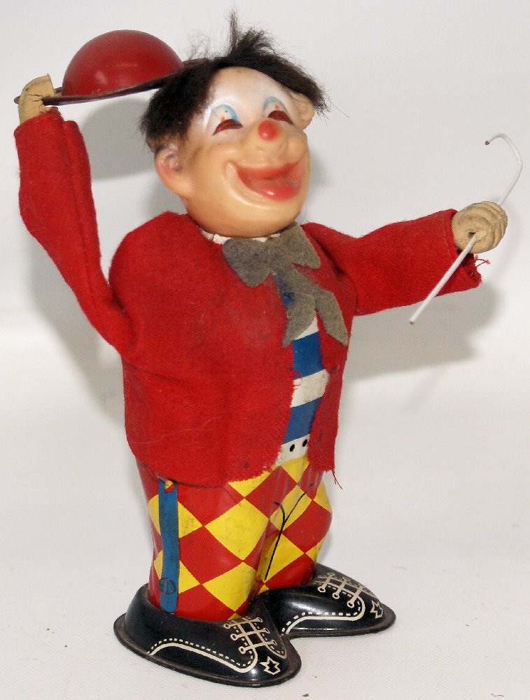 RARE Vintage Tin Wind-up Walking CIRCUS CLOWN w/ Hat &: Vintage Tin Lithographed Mechanical Wind-up Walking CIRCUS CLOWN Raising Hat and Cane, by Yonezawa (Y) Japan. Nice working condition. When wound, the cute little tin circus performer clown with hard p