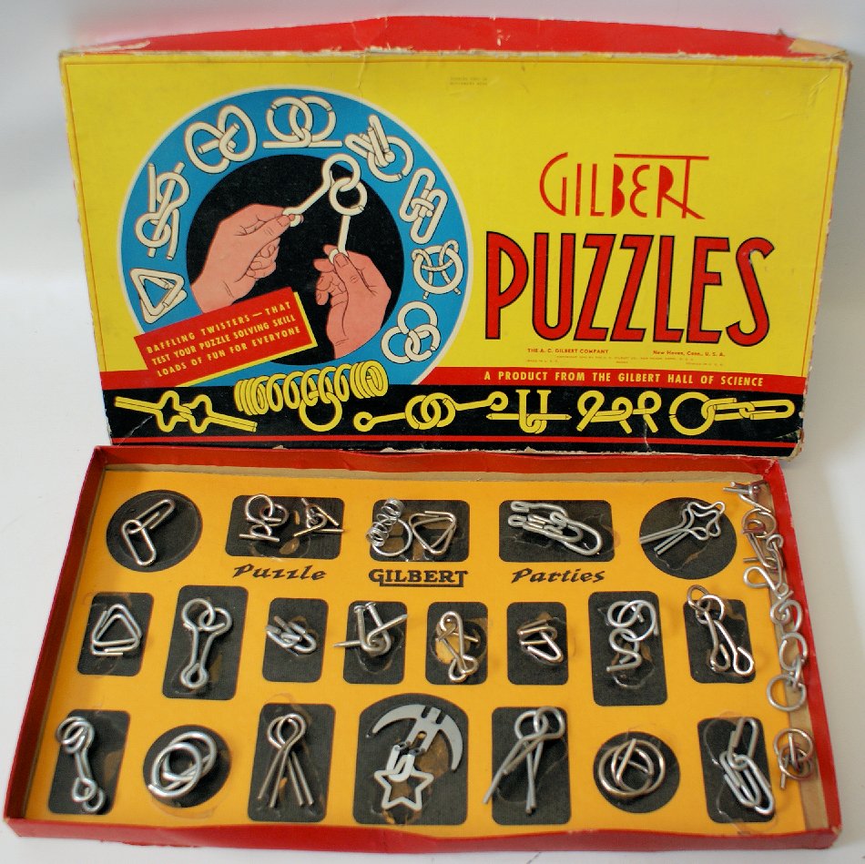Vintage 1940 A. C. Gilbert 21 Metal Puzzles Box Set,: Vintage 1940 A. C. Gilbert Puzzles Box Set. Comes complete with the 21 different metal brain teaser puzzles. I think there are even a few extra in there as well. Fun set with baffling twisters that te
