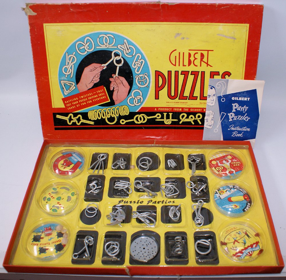 RARE Vintage 1940 A. C. Gilbert Puzzles Box Set with: Vintage 1940 A. C. Gilbert Puzzles Box Set with original inserts and instructions. Contains 20 metal brain teasers puzzles, as well as 6 dexterity skill puzzles. Fun set with baffling twisters that te