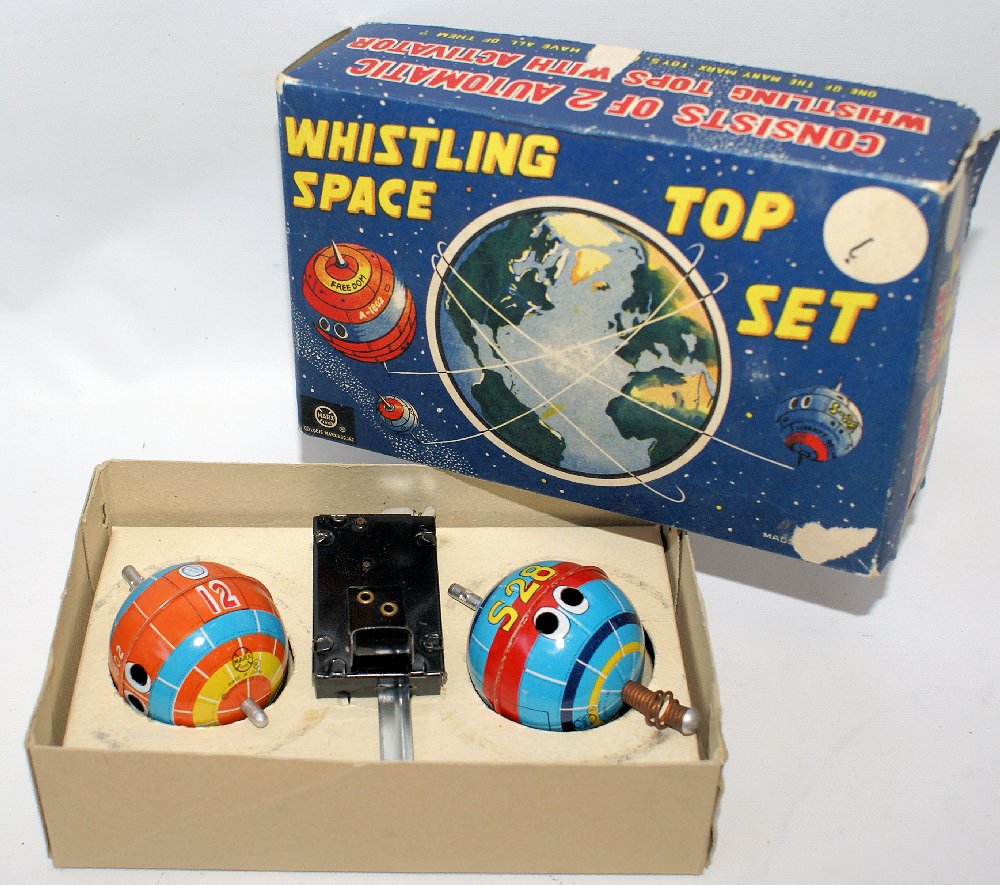 ULTRA RARE Vintage 1958 MARX Whistling Space Top Set in: ULTRA RARE Vintage 1958 MARX Whistling Space Top Set in the Original Box! From the Sputnik era comes this 3-piece Whistling Space Top set made of a combination of lithographed steel and tin and comes