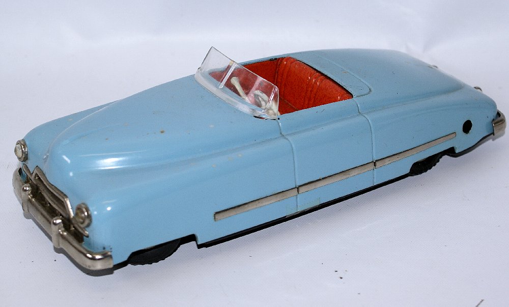 Vintage Tin Clockwork Wind-up JNF Telecar Cabrio, US: Vintage Tin Clockwork Wind-up JNF Telecar Cabrio, US Zone Germany. Beautiful robin egg blue body color with red interior. Has the windshield, steering wheel, shift knob, and windup key. Car measures 1
