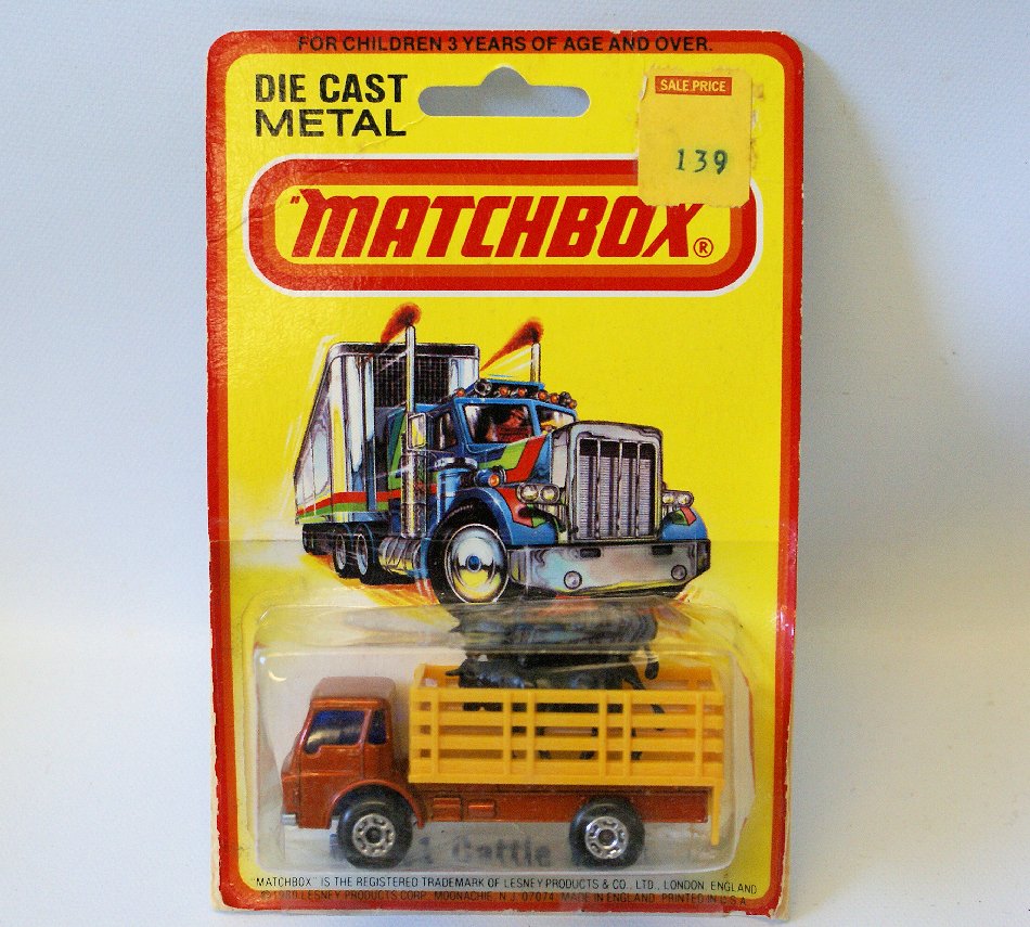 Vintage 1980 MATCHBOX No. 71 CATTLE TRUCK Toy on the: Vintage 1:64 Scale Diecast Metal 1980 MATCHBOX No. 71 CATTLE TRUCK with Cattle Load, on the original card. It looks as though the blister pack has come loose from 3 of 4 of the sides and has been rein