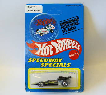 Vintage 1977 HOT WHEELS 43 Formula PACK Race Car No.: Vintage 1:64 Scale Diecast Metal 1977 HOT WHEELS Speedway Specials 43 Formula PACK Race Car No. 9037, sealed on the original UNPUNCHED card. Black car with yellow details. A slight crack on the bliste