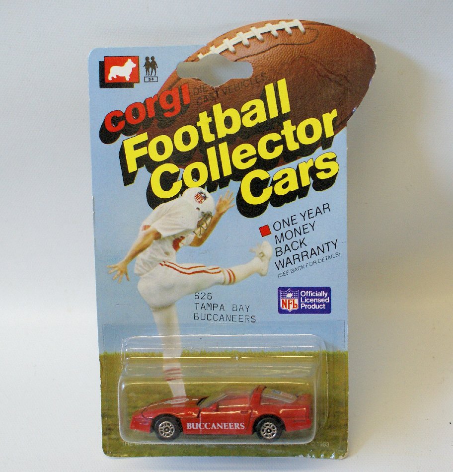 Vintage 1983 CORGI Football Car #626 TAMPA BAY: Vintage 1:64 Scale Diecast Metal 1983 CORGI Football Collector Car #626 TAMPA BAY BUCCANEERS Red Chevy Corvette, sealed on the original card. Card has a couple of very slight creases. Overal LN condit