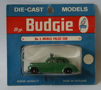 Vintage BUDGIE Diecast Metal No. 5 MOBILE POLICE CAR,: Vintage BUDGIE Diecast Metal No. 5 MOBILE POLICE CAR, on the original card. A couple of very slight creases on card. (Please also use pictures to judge condition for yourself.) Made in England.