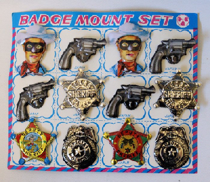 Vintage BADGE MOUNT SET Sheriff, Police, Pistol, and: Vintage BADGE MOUNT SET featuring badges including Special Police, Texas Sheriff Ranger, Deputy Sheriff, pistol gun, and lone star ranger with mask. Made in Japan. Comes complete on the original card.