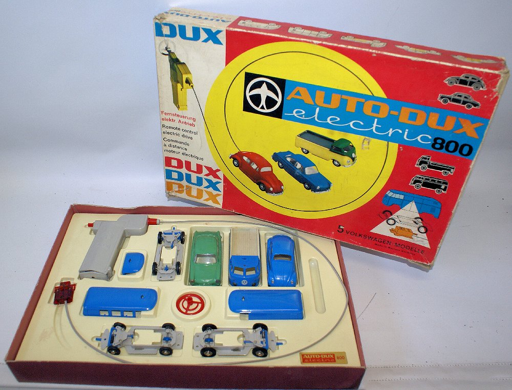 Vintage Bat Op Remote Controlled AUTO-DUX Electric #800: Vintage Battery Operated Remote Controlled AUTO-DUX Electric #800 5 VW Volkswagen Set in the Original Box! Contains 5 VW's cars, truck, and vans. Assembly parts are located underneath the box insert.