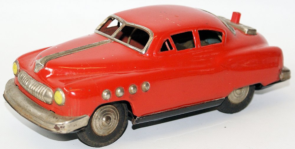 RARE B.O. 1950's Red Cadillac, by Marusan / Kosuge,: Vintage Battery Operated 1950's Red Cadillac, by Marusan / Kosuge, Japan. A georgous battery operated car, very hard to find! Car measures 9" long and is in nice working condition. Has some noticable