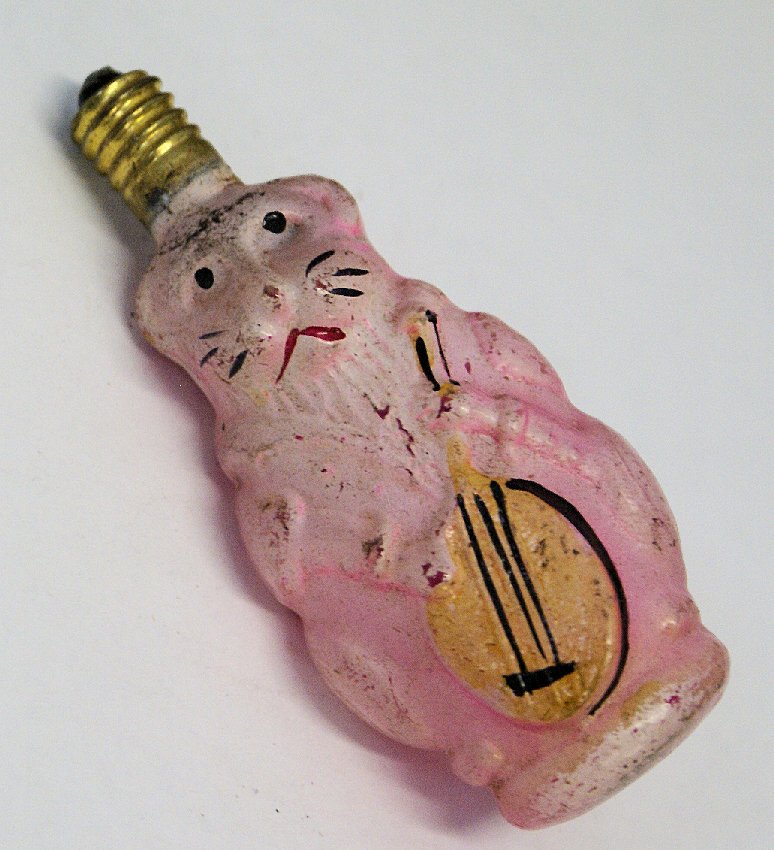 Christmas Painted Glass Cat Playing Banjo Figural C6: Vintage Holiday Christmas Painted Glass Kitty Cat Playing Banjo Instrument Figural C6 Light Bulb, made in Japan, 15V. Marked 15V Japan. No cracks or chips in the glass. Has some paint loss. Please als