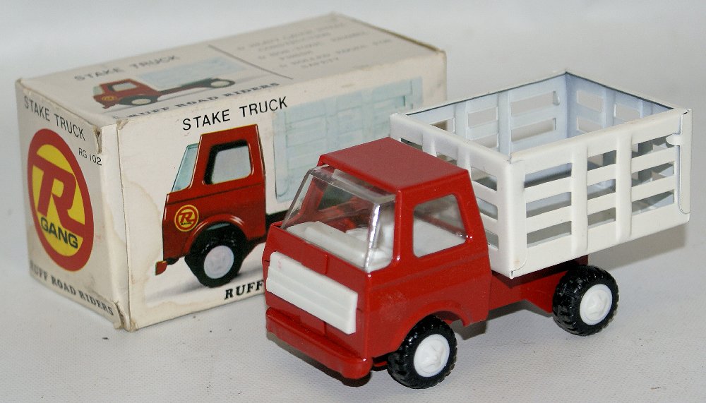 1970s R GANG Stake Truck #RG102 Toy Truck, Mint in the: Vintage 1970s R GANG Stake Truck #RG102 Toy Truck, Mint in the Original Box! 4-1/4" long. Box has some slight shelfwear, but the stakebed truck is MINT MINT MINT! Made in Japan.
