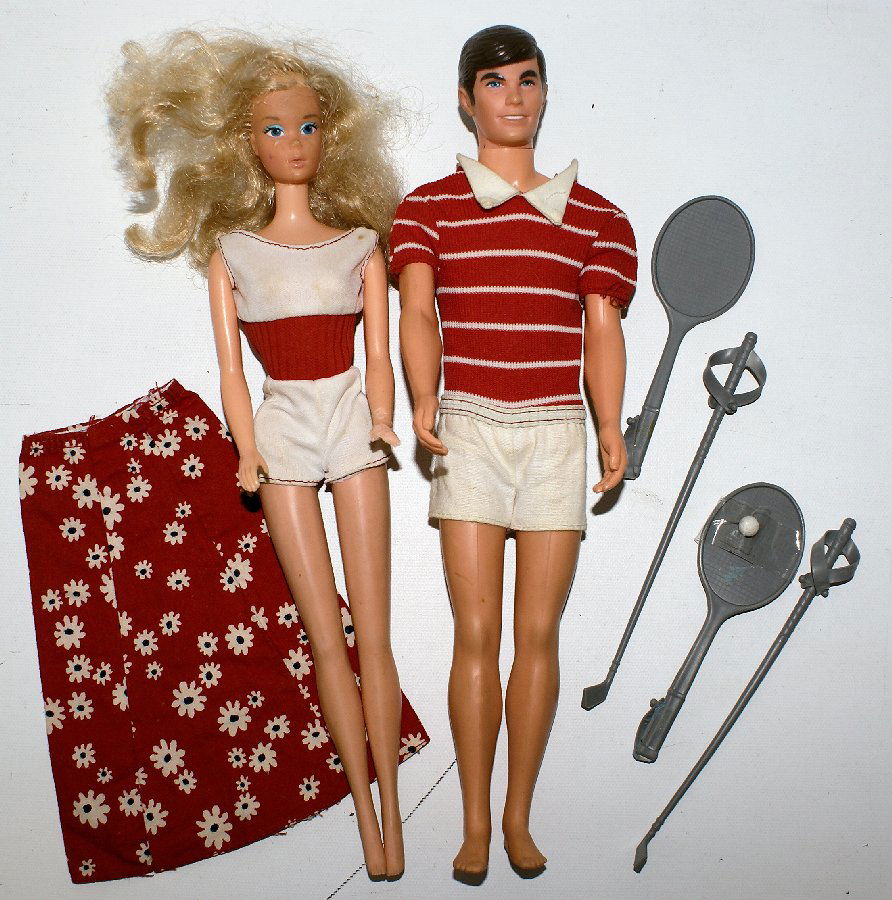 Free Moving #7280 Ken Doll & #7270 Barbie Doll, with: Vintage 1974 1975 Free Moving #7280 Ken Doll and #7270 Barbie Doll, both in original jumpsuits with Barbie's skirt, and 2 tennis rackets and 1 ball, and 2 golf clubs. Specially constructed with a back