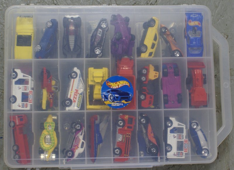 Large Lot of 48 Hot Wheels Cars in Smart Fit Case, all: Large Lot of 48 Hot Wheels Cars in Smart Fit Case. All are in like new condition. Consists of the following: 2002 Hot Wheels 2002 Autonomy Concept with lock button, 1983 Hot Wheels Good Humor Truck, 1