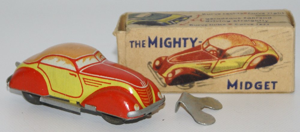 1940's DISTLER / LILIPUT Mighty Midget Tin Windup Toy: Vintage 1940's DISTLER / LILIPUT Mighty Midget Tin Lithographed Wind-up Toy Track Car. Yellow, red and orange. Made in US Zone Germany. Comes in the original box with key. Has a lever that steers the