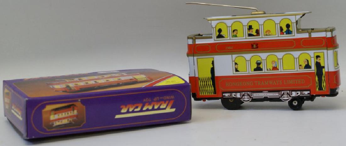 Tin Windup TRAM CAR #1904 Hong Kong Tramways MS263,: Tin Lithographed Wind up TRAM CAR #1904 Hong Kong Tramways Limited with key, MS 263, 6-1/2" long, mint in original box, made in China. Unused and not displayed. Untested. As is.