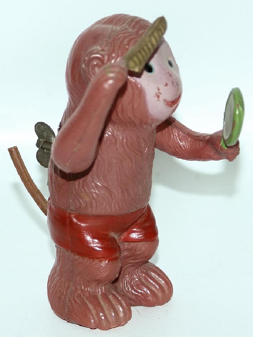 RARE Mechanical Windup Celluloid Monkey Combing Hear & (1 of 2)
