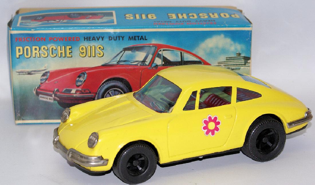 RARE Vintage 1960's DAIYA Japan Tin Friction Powered: RARE Vintage 1960's DAIYA Japan Tin Friction Powered Yellow PORSCHE 911S. LN condition in the original box. A few very slight box rubs on the car roof from the box top. Nice working condition. Car mea