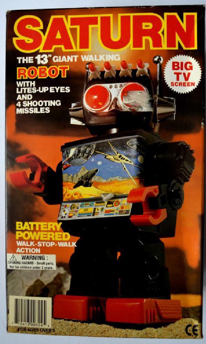 SATURN "THE 13" GIANT WALKING ROBOT" WITH LITES-UP EYES: SATURN "THE 13" GIANT WALKING ROBOT" WITH LITES-UP EYES AND 4 SHOOTING MISSILES. BATTERY OPERATED. WALK-STOP-WALK ACTION.