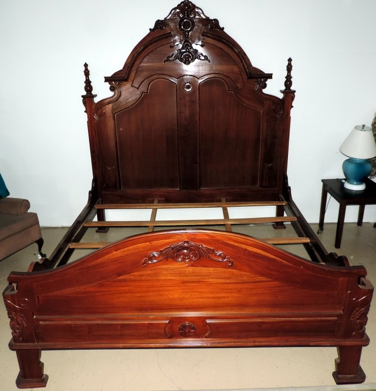 King Size Bed Frame: Being offered for sale is a Walnut Victorian High Back Bed circa 1860. This bed features a high arched head board with a beautifully carved center crest and large turned finials on either side. A larg